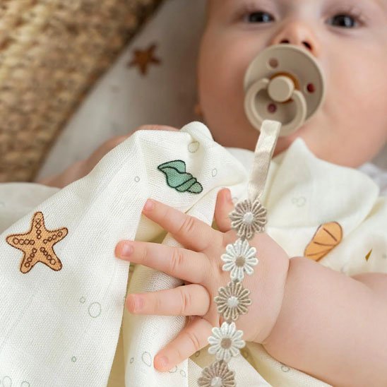 Attache tétine | Marguerites joyeuses - Brico - Bébé.com